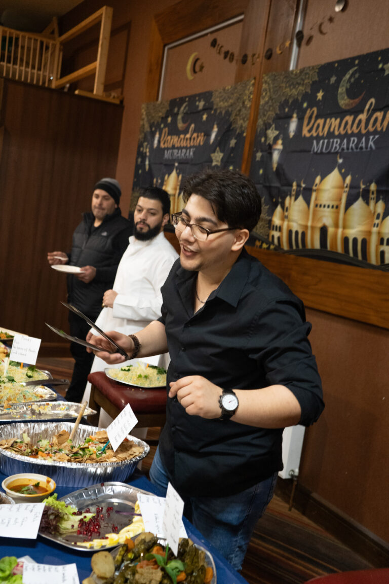Mahmoud serving food